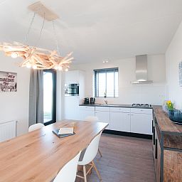 Modern kitchen in Holiday home Oesterdam Resort, Tholen, ideal for culinary adventures.