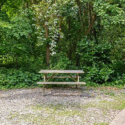 Cozy terrace at vacation home ZE1302 in Koudekerke, surrounded by green nature in Walcheren, Zeeland.