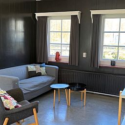 Gezellige woonkamer in Huisje in Koudekerke, vakantiehuis in Walcheren, Zeeland.