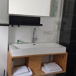 Modern bathroom in Holiday cottage in Koudekerke, Walcheren, Zeeland with spacious sink and stylish decor.