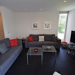 Gemuetliches Wohnzimmer von VZ1185 Modern eingerichteter Ferienbungalow in Oostkapelle in Walcheren, Zeeland.