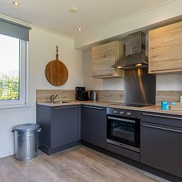 Moderne woonkamer van vakantiehuis ZE1447 in Aagtekerke, Walcheren, Zeeland.