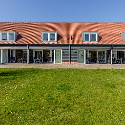 Ruime slaapkamer met meerdere bedden in vakantiehuis ZE1446, Aagtekerke, Walcheren.