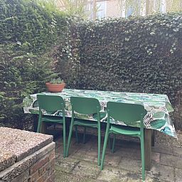 Cozy living room of vacation home ZE1541 in Zoutelande, Walcheren. Comfortable sitting area overlooking the nature of Zeeland.