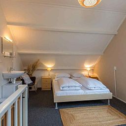 Hall with closet in vacation home ZE1392 in Zoutelande, Walcheren.