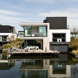 Detached house in Arnemuiden with modern waterfront terrace, ideal vacation home in Walcheren, Zeeland for a relaxing stay.