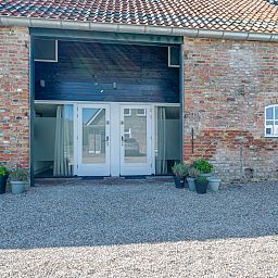 Modern kitchen and dining area in vacation home ZE1152, Veere, Walcheren, Zeeland.