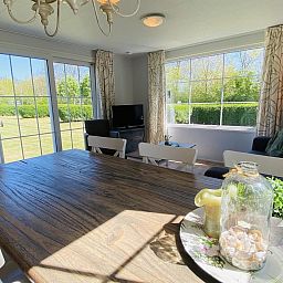 Dining area in VZ235 Chalet Veere in Veere, Zeeland with garden view