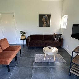 Stylish living room in VZ1064 Luxury vacation apartment in Veere, Walcheren, Zeeland.