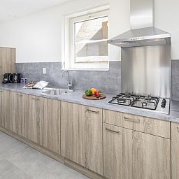 Luxuskueche in V8 Luxusferienhaus in Nieuwvliet-Bad, ausgestattet mit allen modernen Geraeten.