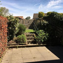 Hinterhof von VZ924 Ferienhaus in Cadzand mit gruener Umgebung in Cadzand-bad, Zeeland.