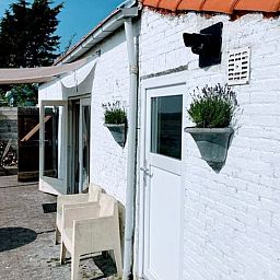 Vakantiehuis in Walsoorden met sfeervol terras, ideaal voor een verblijf in Zeeuws-Vlaanderen, Zeeland.