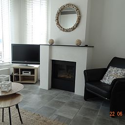 Picturesque view of the mill near vacation home ZE1542 in Biervliet, Zeeland.