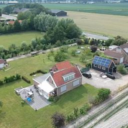 Aerial photo of Huisje in Lewedorp, a vacation home surrounded by nature in South Beveland, Zeeland.