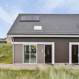 Reihenhaus in Ouddorp, ein Ferienhaus in Goeree-Overflakkee, Sdholland, umgeben von Dnen und Natur.