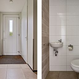 Gemtliches Wohnzimmer in Geschakelde woning in Ouddorp, Ferienhaus mit Blick auf die Natur in Ouddorp, Goeree-Overflakkee, Sdholland.