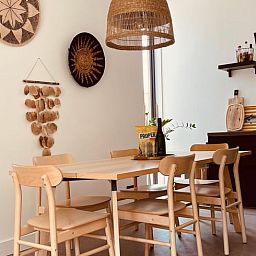 Dining Room in Cottage in Ouddorp, a vacation home in Goeree-Overflakkee, South Holland with stylish decor.