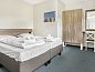 Guest house 660159 • Bungalow Goeree-Overflakkee • Strand Resort Ouddorp Duin | 24-persoons villa - Sterduin |   • 13 of 23