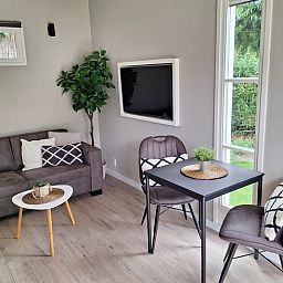 Stilvolles Wohnzimmer von Huisje in Nieuwveen, Ferienhaus in Green Heart, Suedholland.