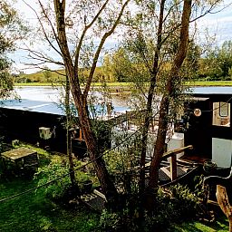 Holiday home ZH491 in Rotterdam with charming terrace and garden, ideal for a relaxing stay in South Holland.