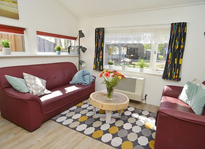 Coming good vacation home in De Cocksdorp Texel with cozy porch and garden statues