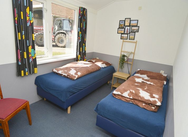 Rustic terrace at Comes well vacation home in De Cocksdorp Texel with green surroundings