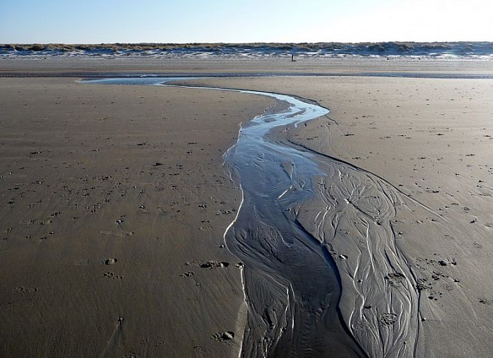 Gezellige woonkamer van Ons Eilandgevoel in De Cocksdorp, Texel, met comfortabele zitruimte.