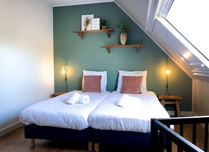 Stilvolles Interieur von Unique 10 pers. Farm Lodge De Slufter in 'Hoeve Vianen' in De Cocksdorp, Texel, mit moderner Beleuchtung.