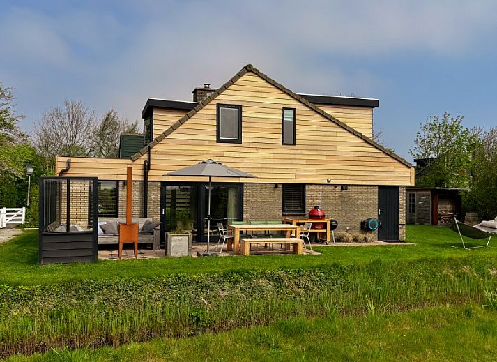 Kaap Zilt Texel Ferienhaus mit grossem Garten in De Cocksdorp, Watteninseln, umgeben von Natur.