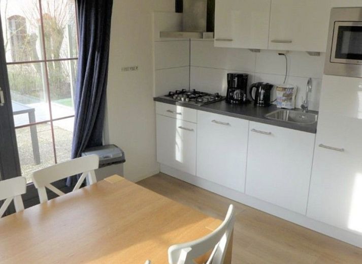 Wooden garden house at Ferienperle vacation home in De Cocksdorp, Texel, Wadden Islands.