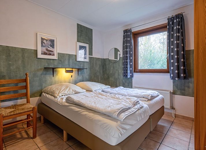 Ruime keuken in Vakantiehuis Slufterhoek 114, De Cocksdorp, Texel, met moderne apparatuur en gezellige eethoek.