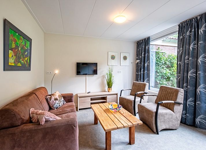 Vakantiehuis Slufterhoek 150 in De Cocksdorp Texel met groene tuin en terras.