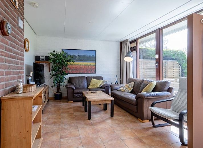 Vakantiehuis Slufterhoek 100 in De Cocksdorp, Texel met zonnig terras en groene tuin.