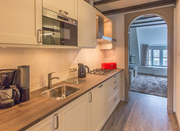 Type X-7 vakantiehuis in De Cocksdorp, Texel met rieten dak en ruime tuin, Waddeneilanden.