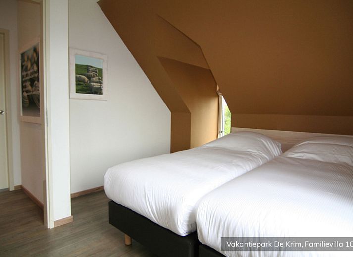 Familienvilla fuer 10 Personen in De Cocksdorp, Texel, mit schoener Aussicht auf den Teich und die umliegende Natur.