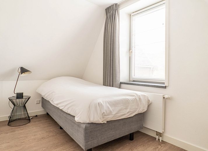 Lichte woonkamer van Type D Kikkertstraat in De Cocksdorp, Texel, vakantiehuis met comfortabele inrichting.