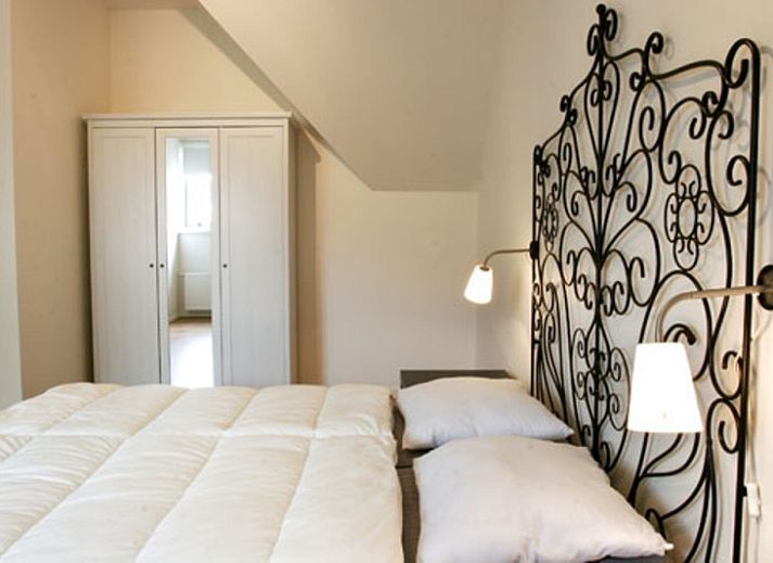 Lichte woonkamer van Type 8 - 2108 vakantiehuis in De Cocksdorp, Texel, met moderne inrichting.