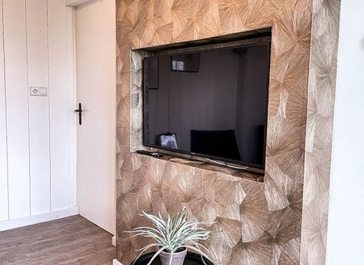 Stijlvolle zithoek in Vakantiehuis De Roggesloot, De Cocksdorp, Texel, ideaal voor ontspannen momenten.