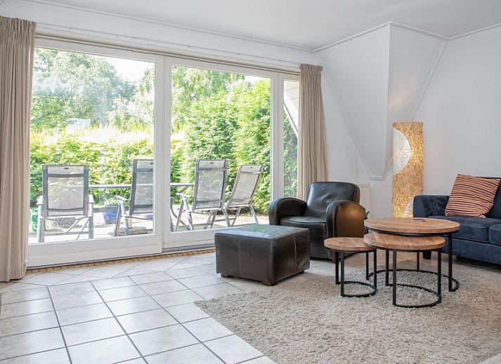 Vakantiehuis Slufterduin 076 in De Cocksdorp biedt een charmante buitenkant op Texel, ideaal voor een ontspannen verblijf op de Waddeneilanden.