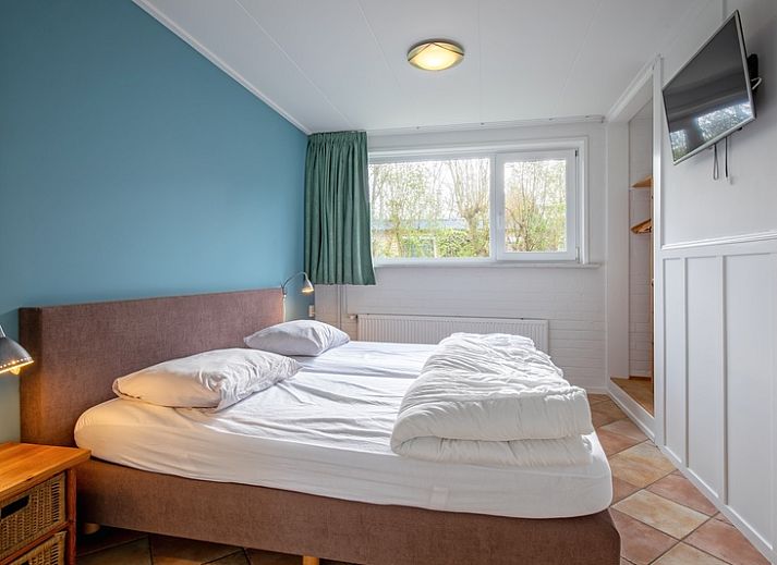 Gezellige woonkamer van Vakantiehuis Slufterduin 134 in De Cocksdorp Texel met comfortabele zitplaatsen.