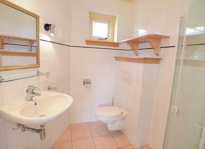 Gezellige woonkamer van De Velduil vakantiehuis in De Cocksdorp, Texel.