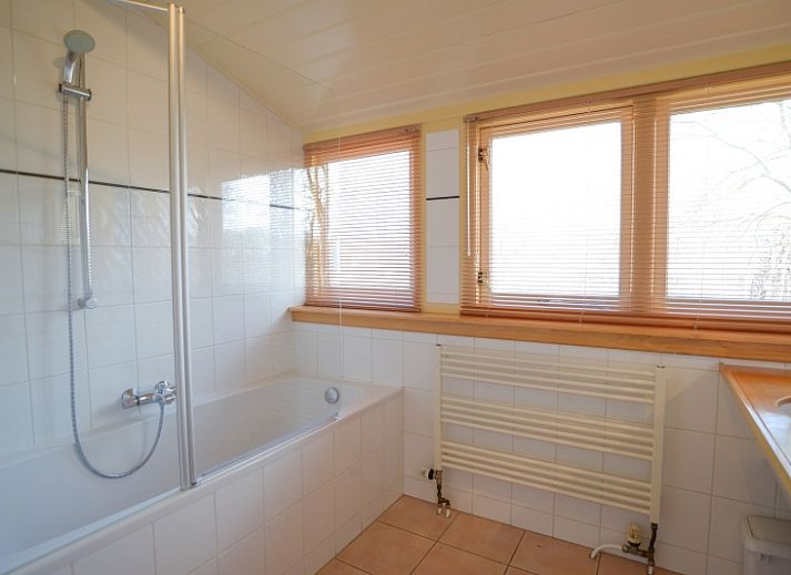 Gezellige woonkamer van De Velduil vakantiehuis in De Cocksdorp, Texel.