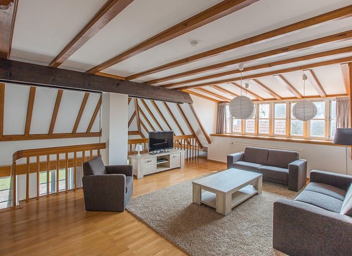 Charmant vakantiehuis Type W in De Cocksdorp, Texel met rieten dak en groene omgeving.