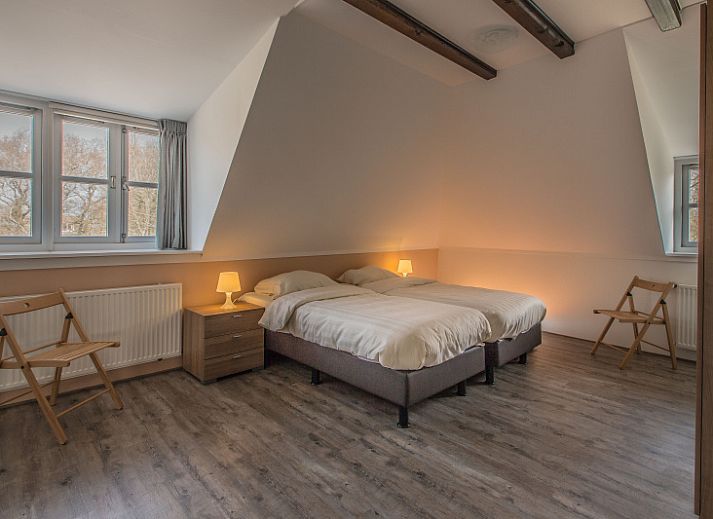 Charmant vakantiehuis Type W in De Cocksdorp, Texel met rieten dak en groene omgeving.