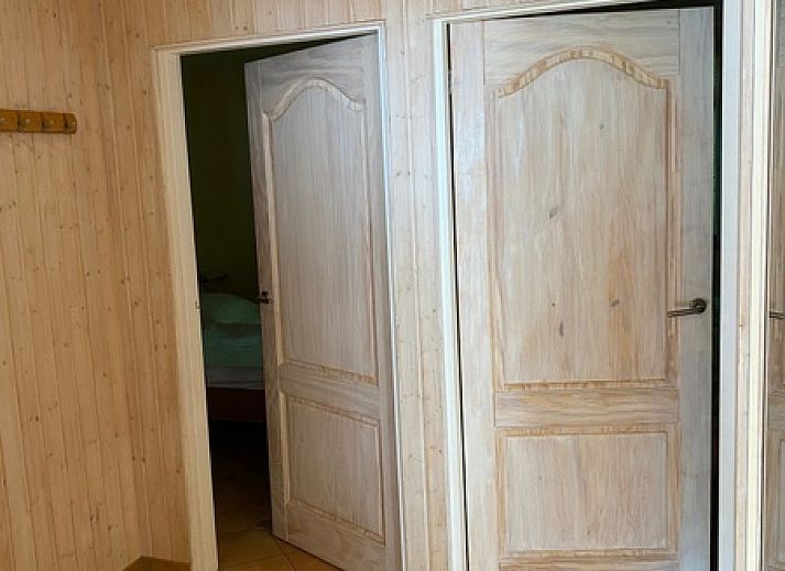 Comfortabele zithoek in Vakantiehuis Slufterhoek 128, De Cocksdorp, Texel met warme inrichting.