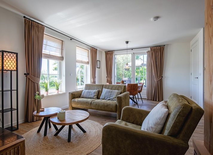 Apartment A in De Cocksdorp Texel with spacious garden and terrace for relaxation.