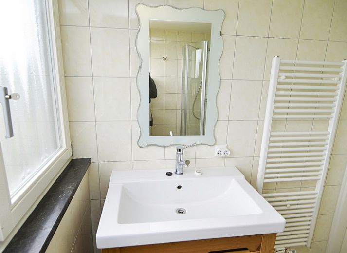 Comfortable sitting area in Plexat, vacation home in De Cocksdorp, Texel, ideal for relaxation.