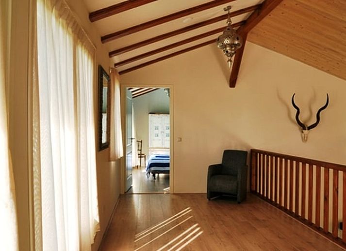 Ferienhaus in De Cocksdorp, Texel: charmantes Ferienhaus mit grossem Garten und Terrasse auf den Watteninseln, ideal zum Entspannen in der Natur.