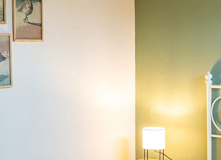 Ferienhaus in De Cocksdorp, Texel, ein charmantes Ferienhaus mit einer einladenden Terrasse, umgeben von der Natur der Watteninseln.