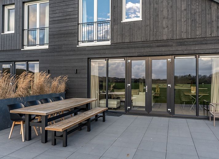 Moderne zithoek in Princenhof 3 vakantiehuis De Cocksdorp Texel.